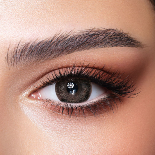 ASH BROWN - Xena Optic - Medical and CosmeticLens Bio compatible elements making the lens soft & comfortable throughout the day High Water retention that allow high oxygen permeability Ideal for eye dryness High Definition design & UV blocker USA materials FDA & CE approved - Contact Lenses BELLA